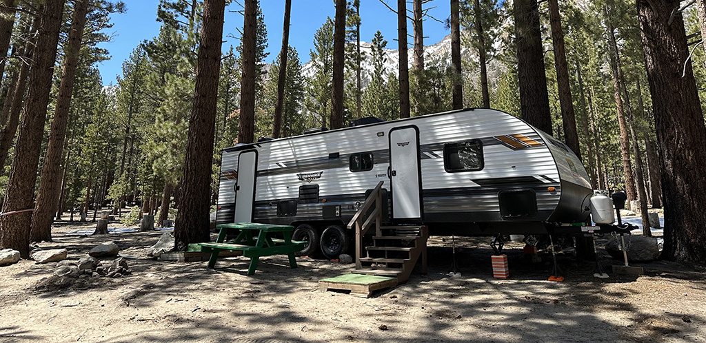 New 28-foot trailer model in the tall pines of the High Sierra